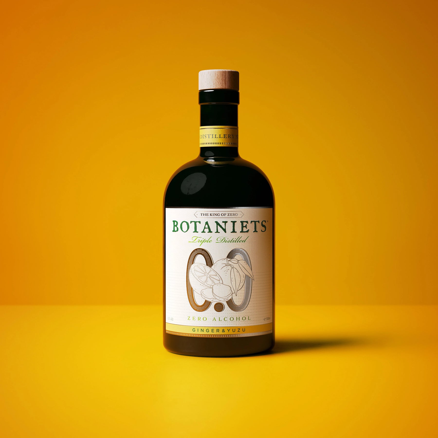 Botaniets Ginger-Yuzu, taste it to believe it! Bottle of alcohol-free spirit on a vibrant yellow background.
