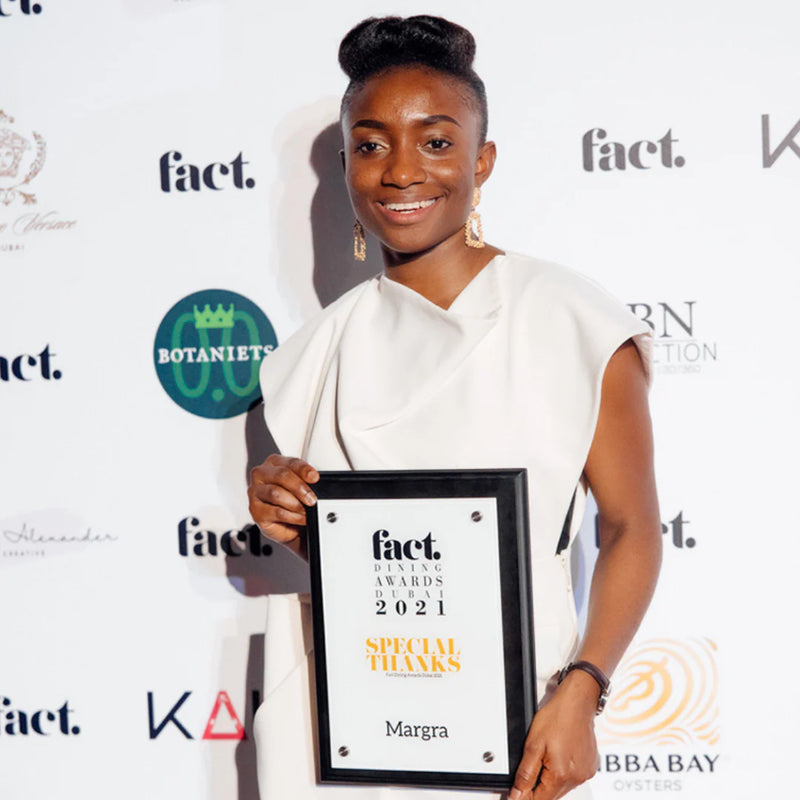 Botaniets official partner of the Gastronomy Fact Awards Dubai, recipient Margra holding special thanks plaque.